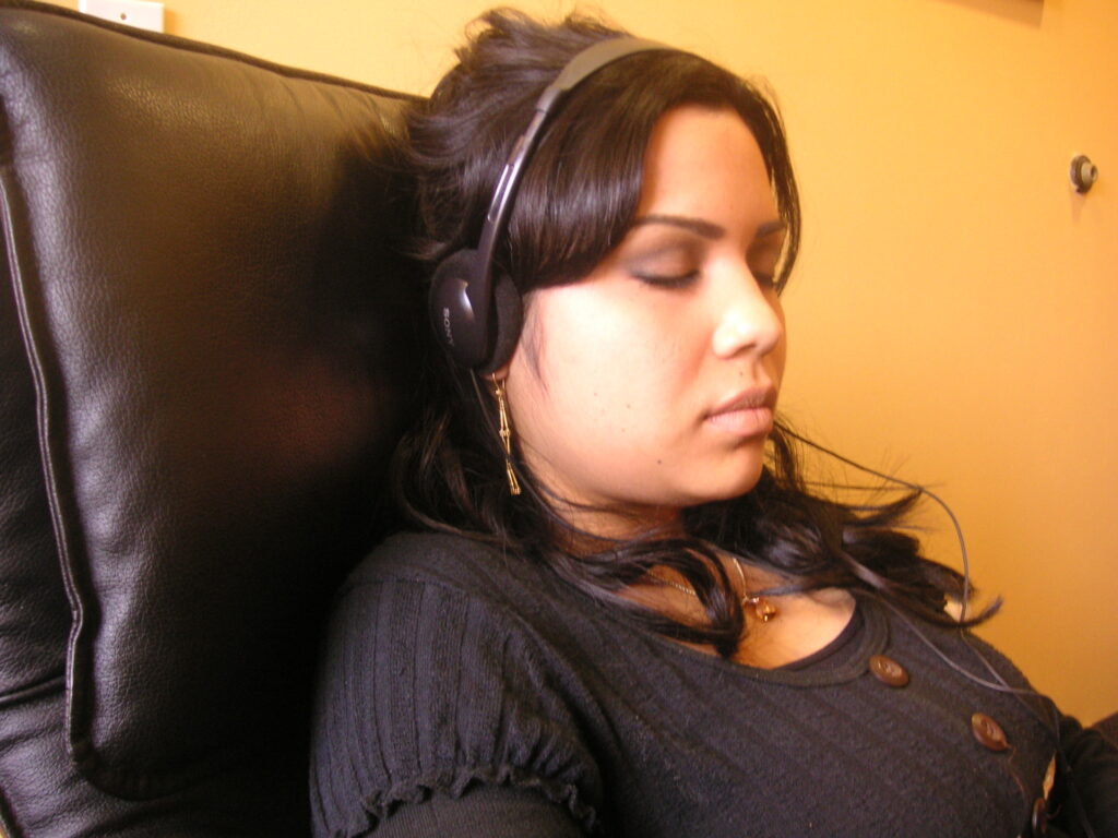 Person listening to audio course